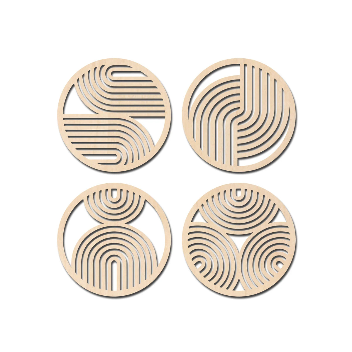 A set of four round wooden wall art pieces featuring concentric line patterns.