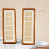 A high-grade bocote photo frame display stand featuring a light wood frame and white interior, resting on a marble surface.
