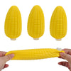 A set of three yellow corn-shaped squishy stress balls, shown individually and being held by hands.