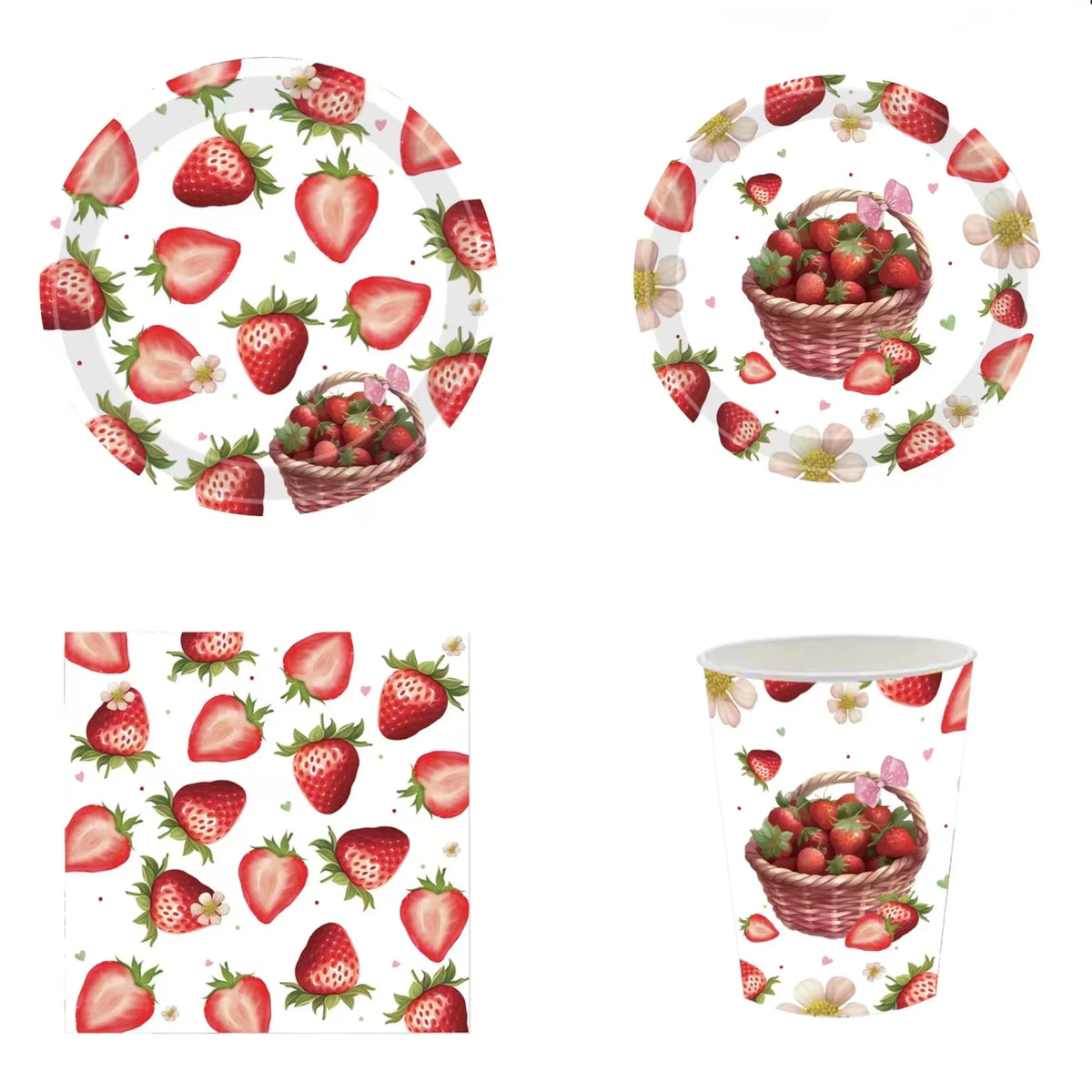 A set of strawberry theme birthday party decorations including ornaments and a banner.