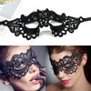Black lace floral eye mask for masquerade and cosplay worn by a woman.