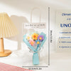 A clear plastic bag containing a handcrafted crochet flower bouquet with a teddy bear and a ribbon