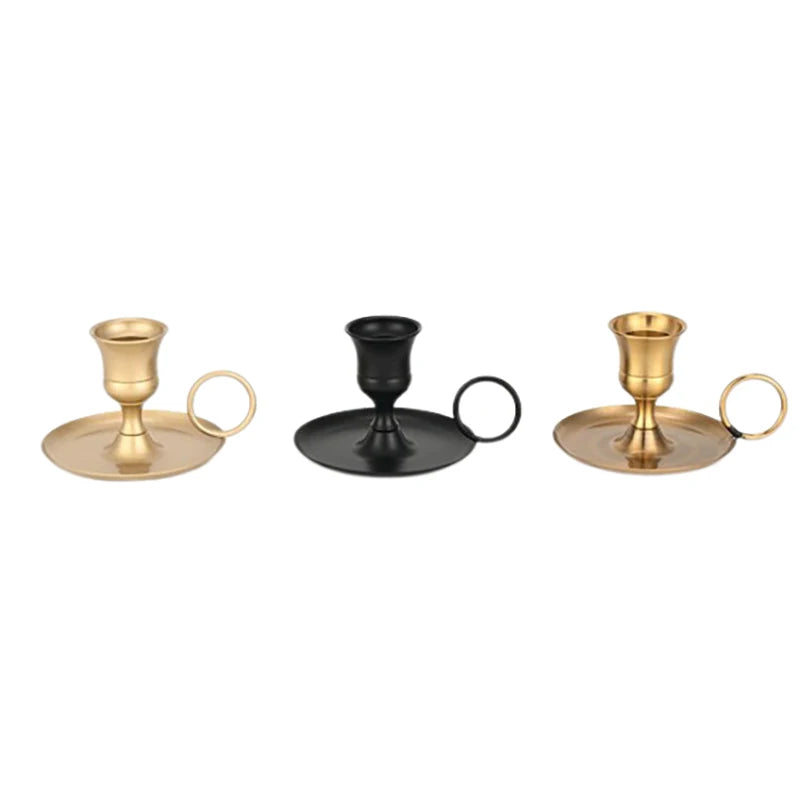 Elegant metal candle holder with handle for dining and decor in gold and black finishes