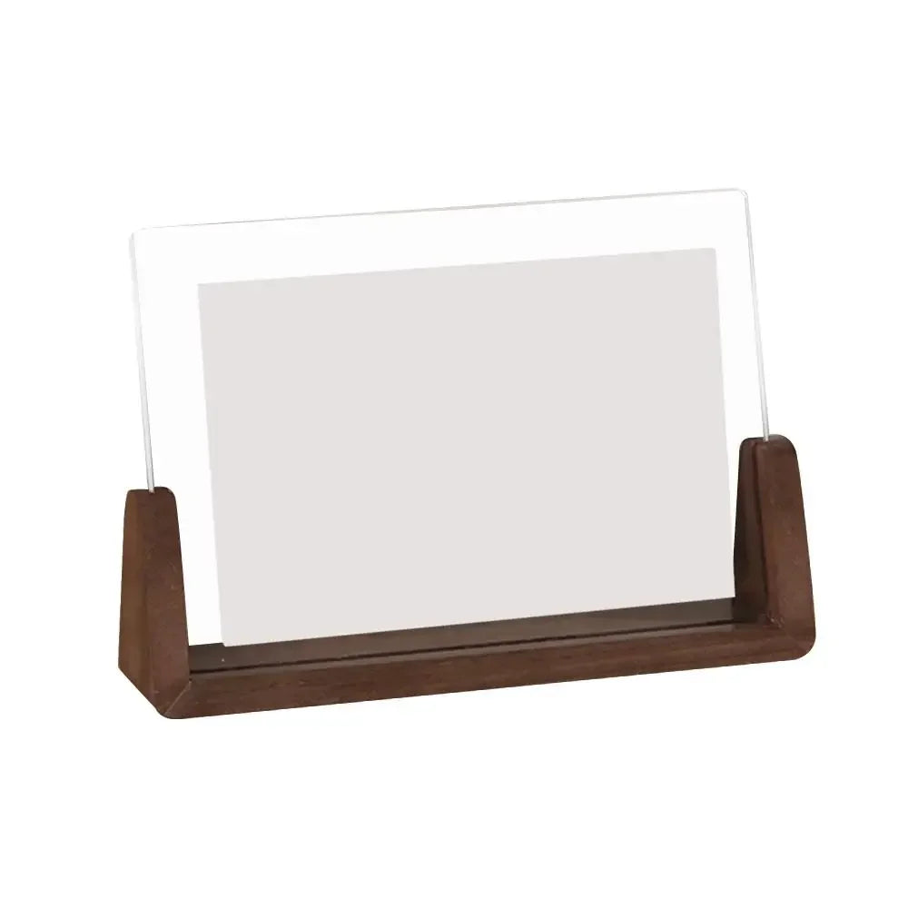 Walnut wood and acrylic photo frame for desktop display with a clear glass panel.