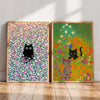 Canvas wall art featuring a black cat silhouette amidst a vibrant field of pink, purple, and green flowers.