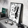 Anime wall art featuring a character with sharp teeth and dark clothing, displayed in a black frame.
