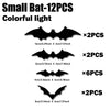 Set of 12 small bat wall decals with colorful light, featuring various sizes.