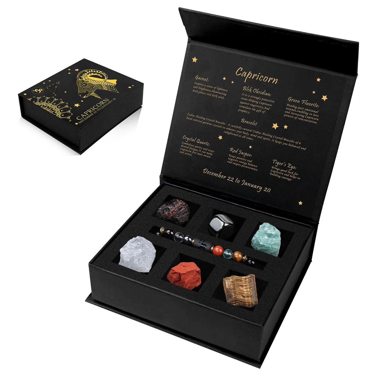 A black gift box containing a natural stone zodiac bracelet and various crystals for Capricorn.