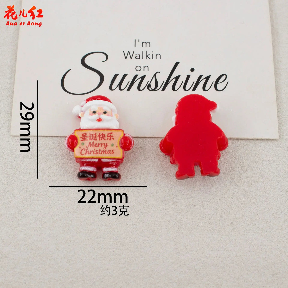 Two resin figurines, one white Santa and one red bear, are displayed on a card with the text I'm Walkin on Sunshine.