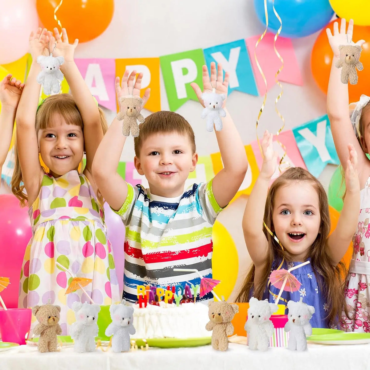 A colorful display of mini plush teddy bear keychains and toys surrounded by happy children.