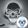 A glowing LED skull mask is shown against a gray background, highlighting its detailed skeletal structure.