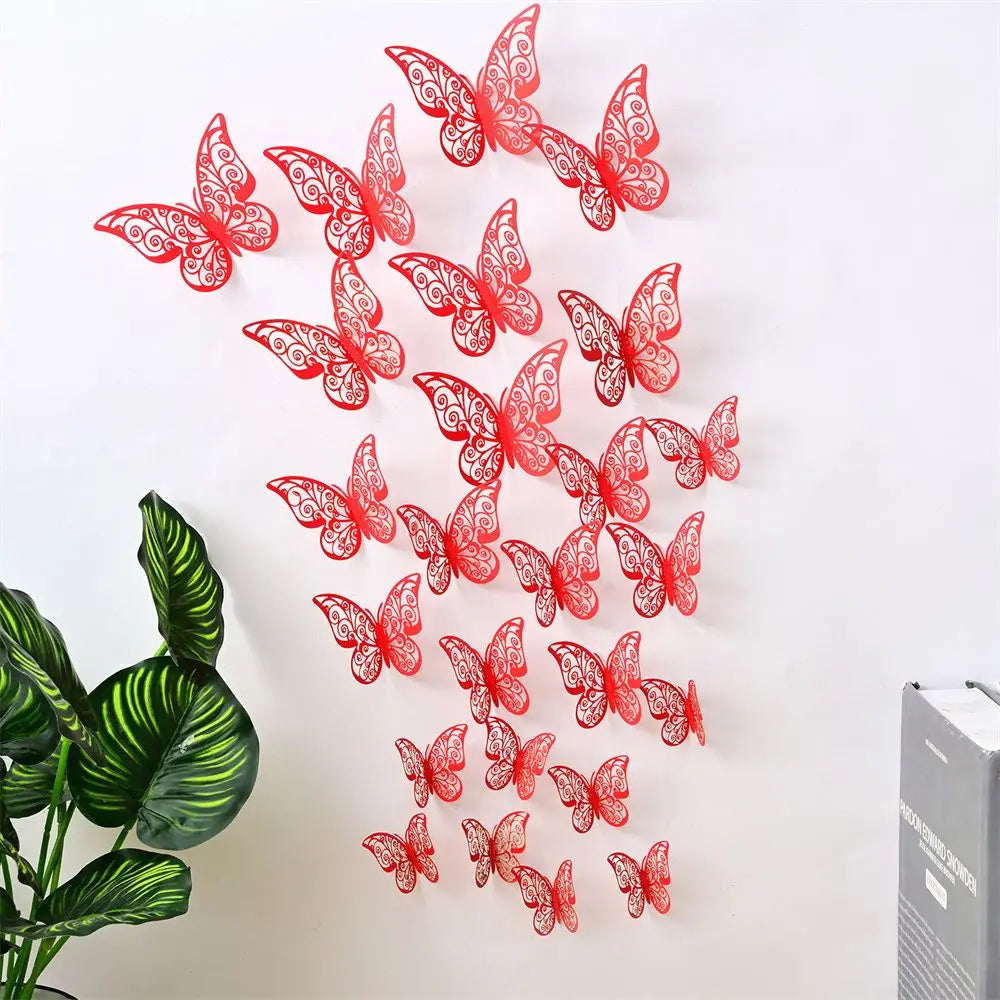A set of red 3D hollow butterfly wall decals scattered on a white background.