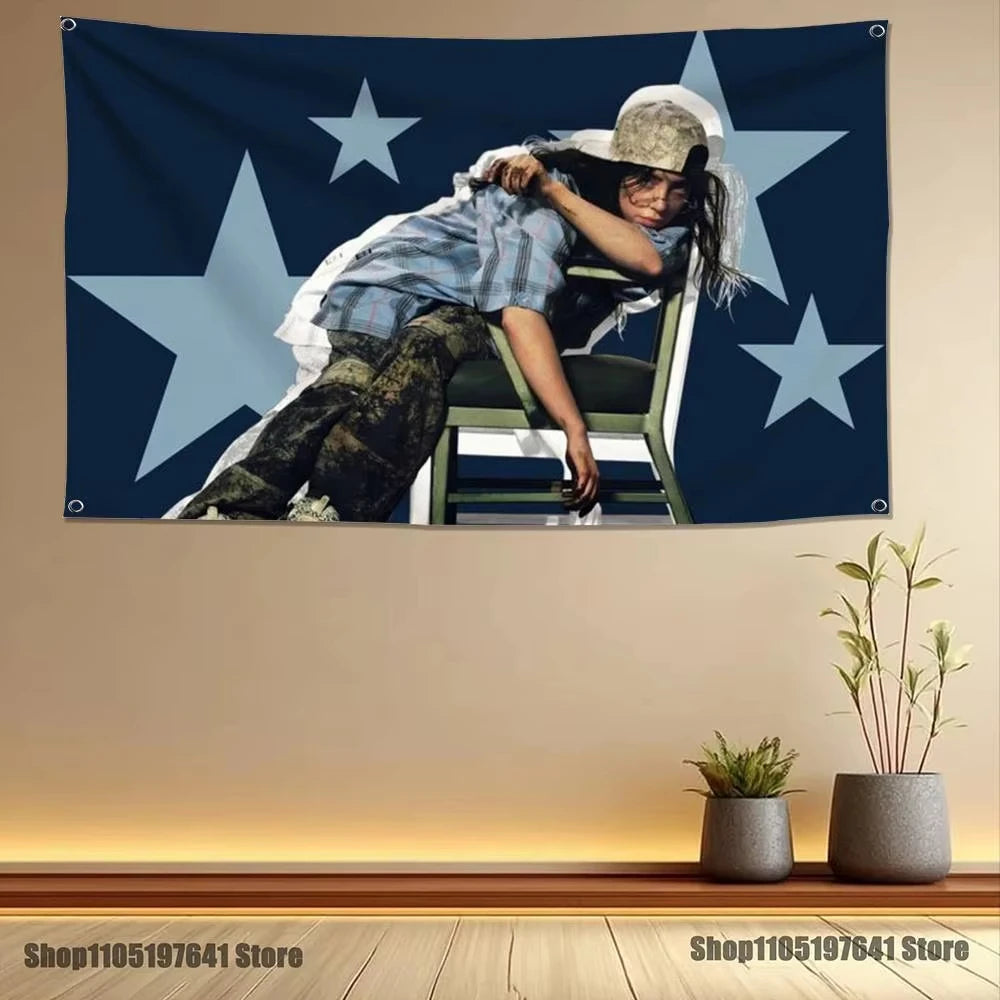 A woman wearing a hat and plaid shirt is depicted on a dark blue tapestry banner featuring large white stars.