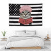A tapestry featuring a cat face design on an American flag background.