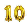 A golden foil number balloon shaped like the number 10 for birthday party decor