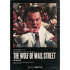 A movie poster for The Wolf of Wall Street featuring a close-up intense male actor.