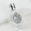 Decorative glass bottle with a silver figurine inside and a twist cap