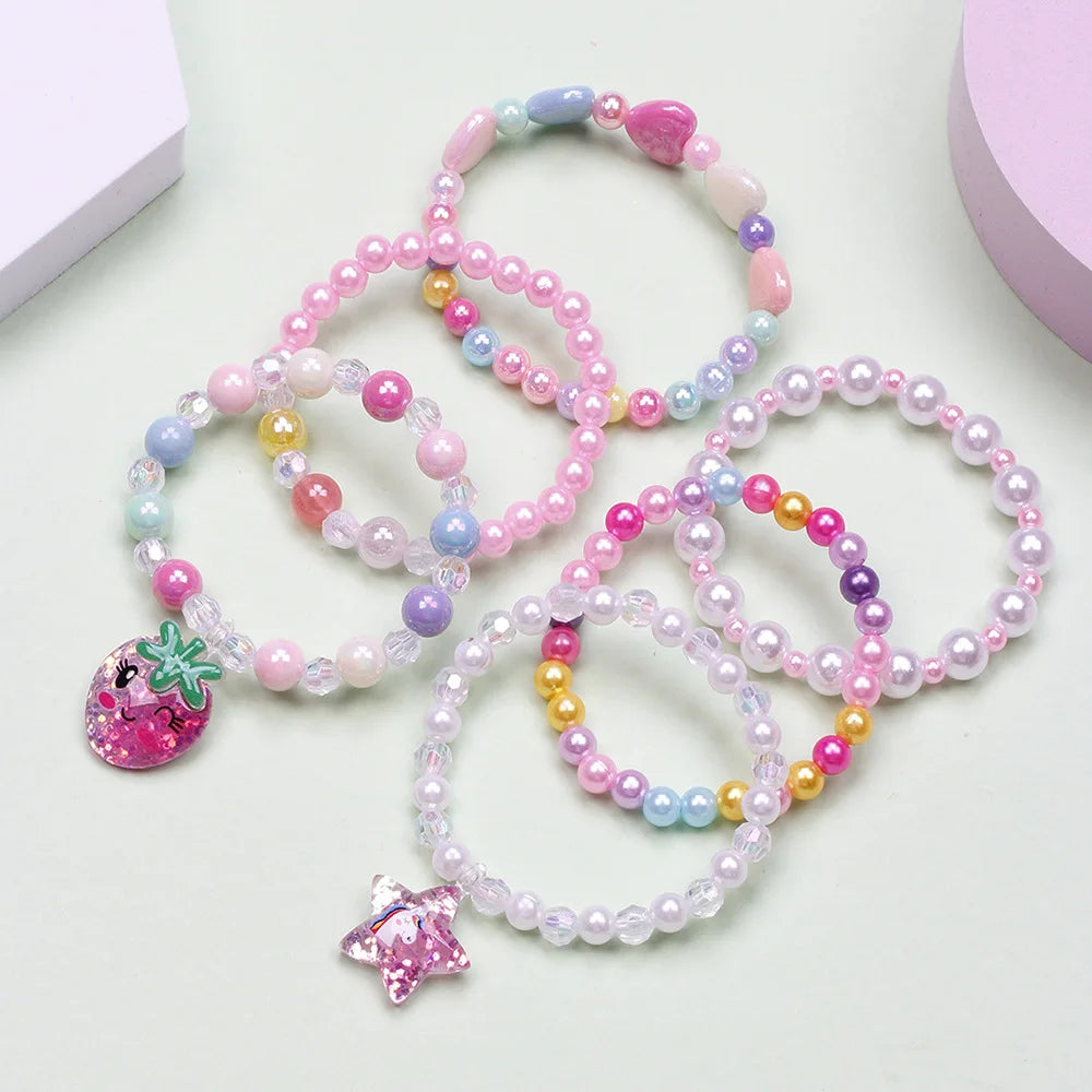 A set of six beaded bracelets featuring pink, purple, and blue stones in various shades and designs.