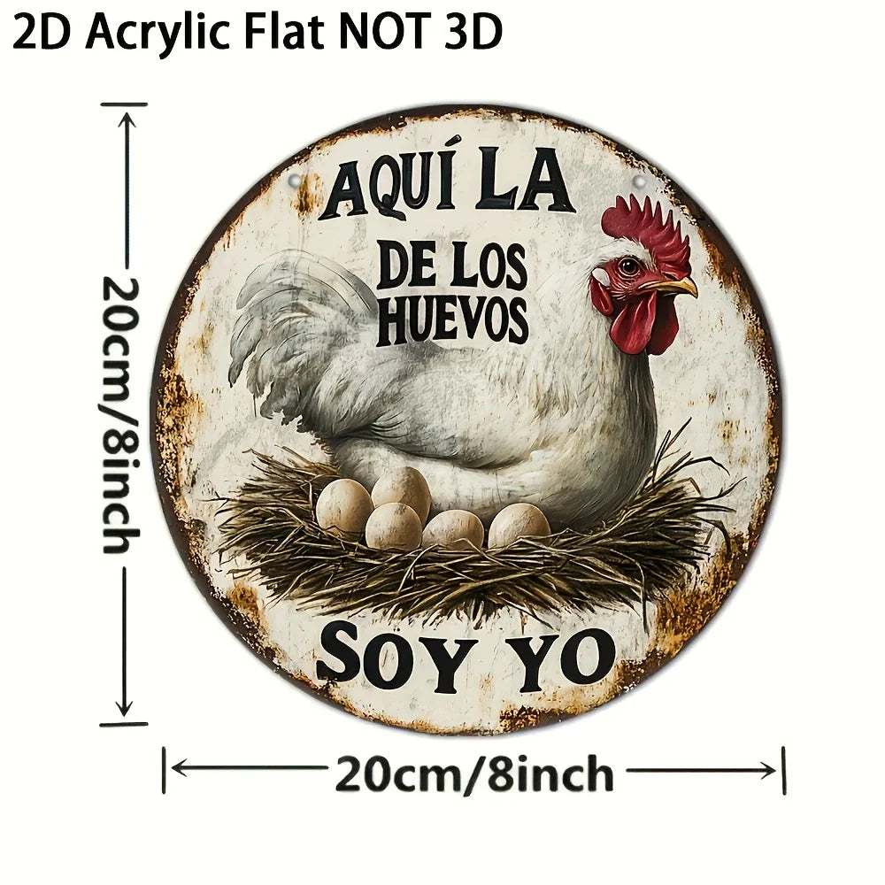 A rustic round wall sign featuring a white hen and text in Spanish that translates to I am the one of the eggs.