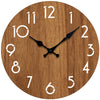 A round wooden wall clock with a brown finish and black hands displaying the time.