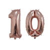 Two rose gold foil number balloons shaped like 1 and 0 for birthday party decor