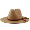 A wide brim straw sun hat in tan with a brown cord detail.