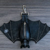 Black leather bat-shaped wallet keychain with a zipper coin purse