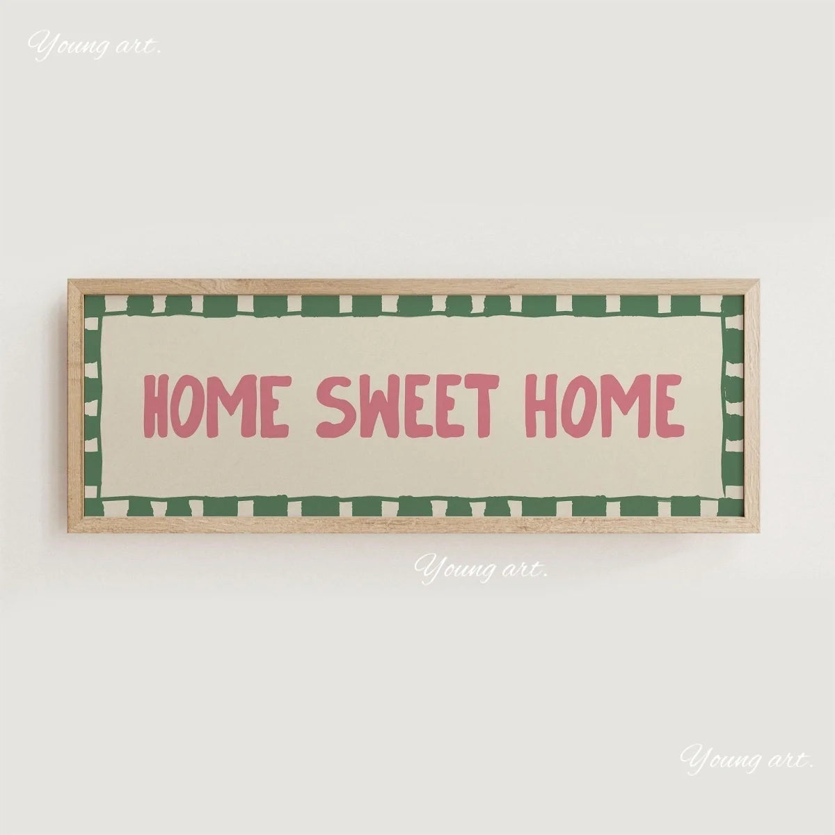A framed canvas print with the text HOME SWEET HOME in pink lettering on a cream background with a green border.