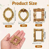 Three gold-colored miniature vintage picture frames shown next to a hand for scale.