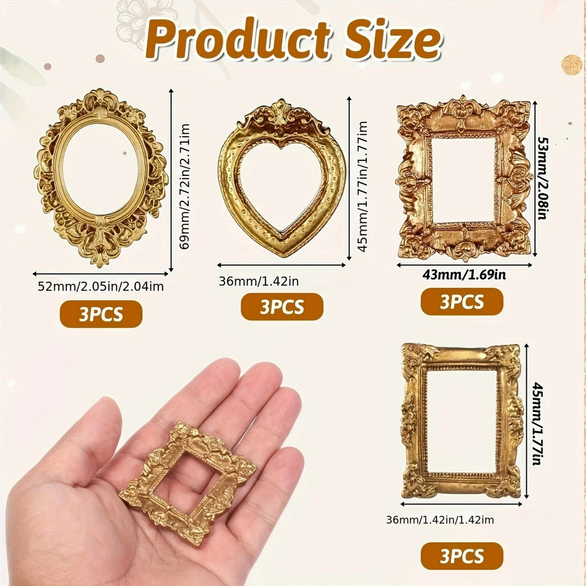 Three gold-colored miniature vintage picture frames shown next to a hand for scale.