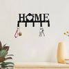 Black wall key holder with a house silhouette and hooks for keys