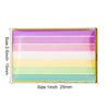 A rectangular lapel pin featuring horizontal stripes of pink, white, and light green colors.