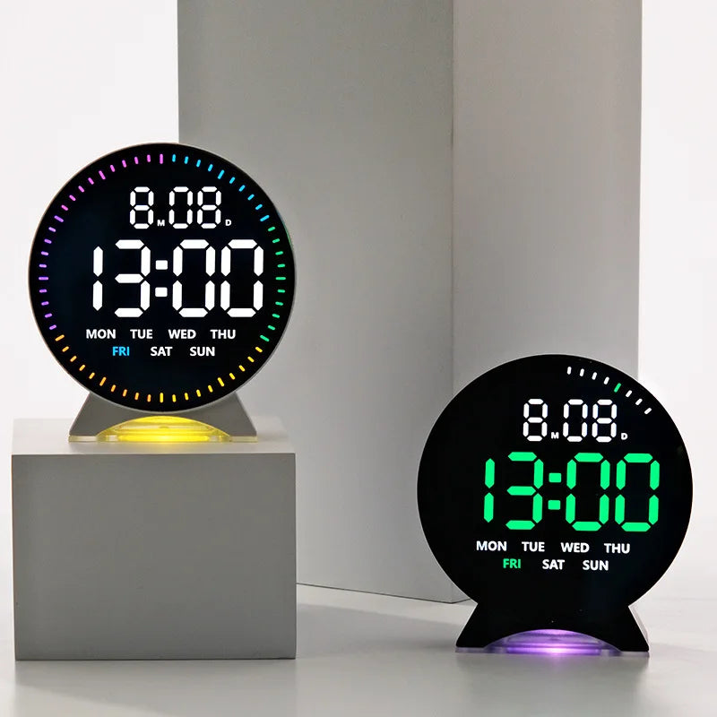 A black LED alarm clock displaying 13:00 and 8.08 with a purple glow on a white surface.