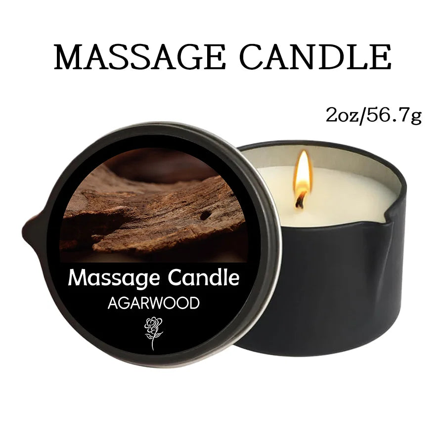 A black jar of massage candle with a lit wick and an inset photo of agarwood.