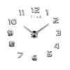 A modern 3D acrylic wall clock face showing the numbers 1 through 12.