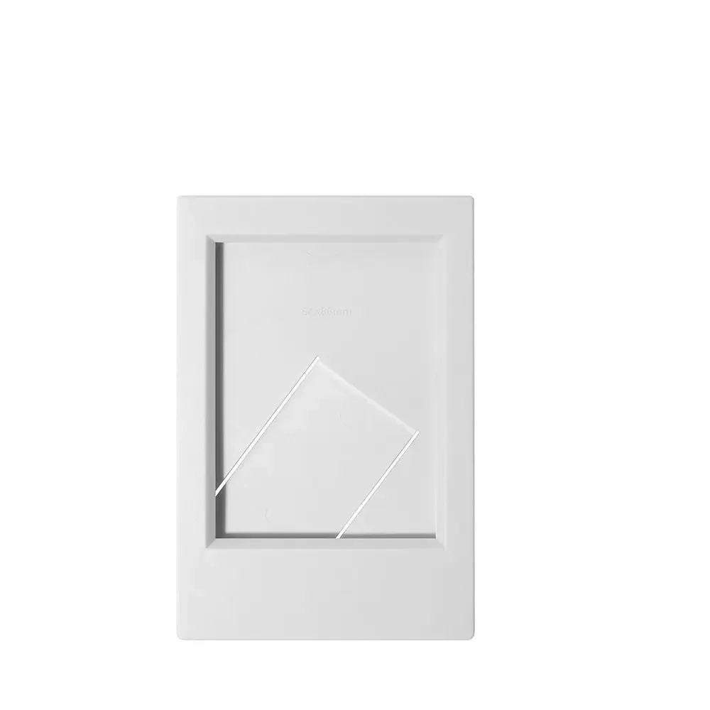 A white mini film frame designed to hold Fuji Instax instant photos.