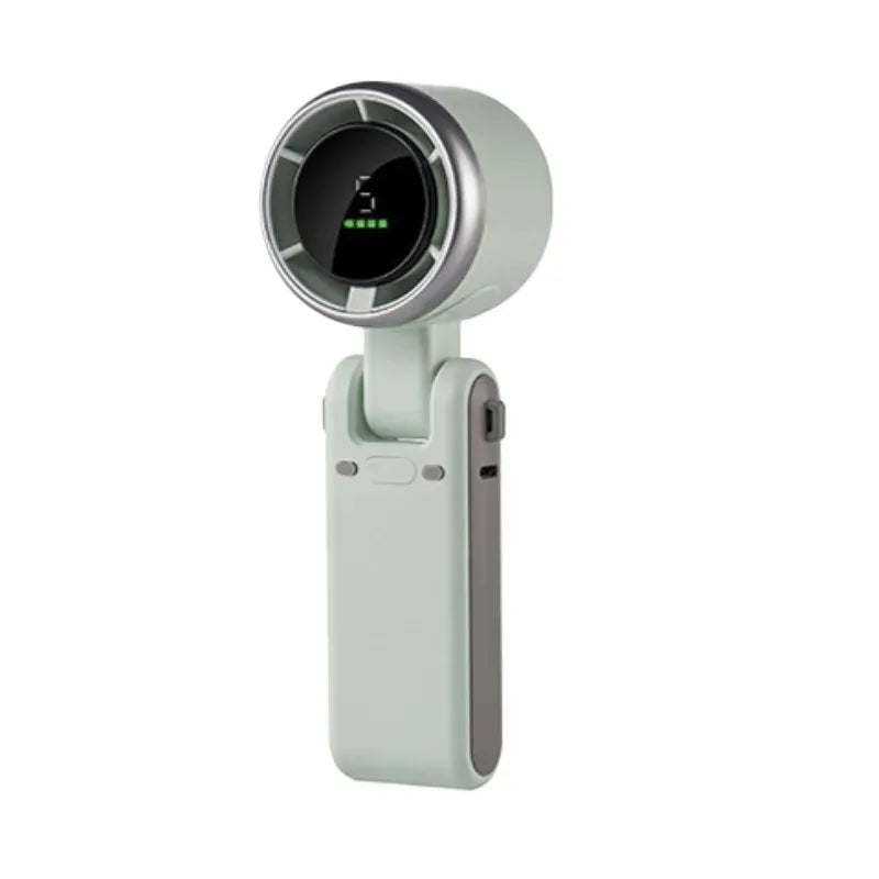 A compact, light green handheld fan with a circular display and charging port.