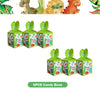Six green cardboard boxes decorated with dinosaur themes for a birthday party kit