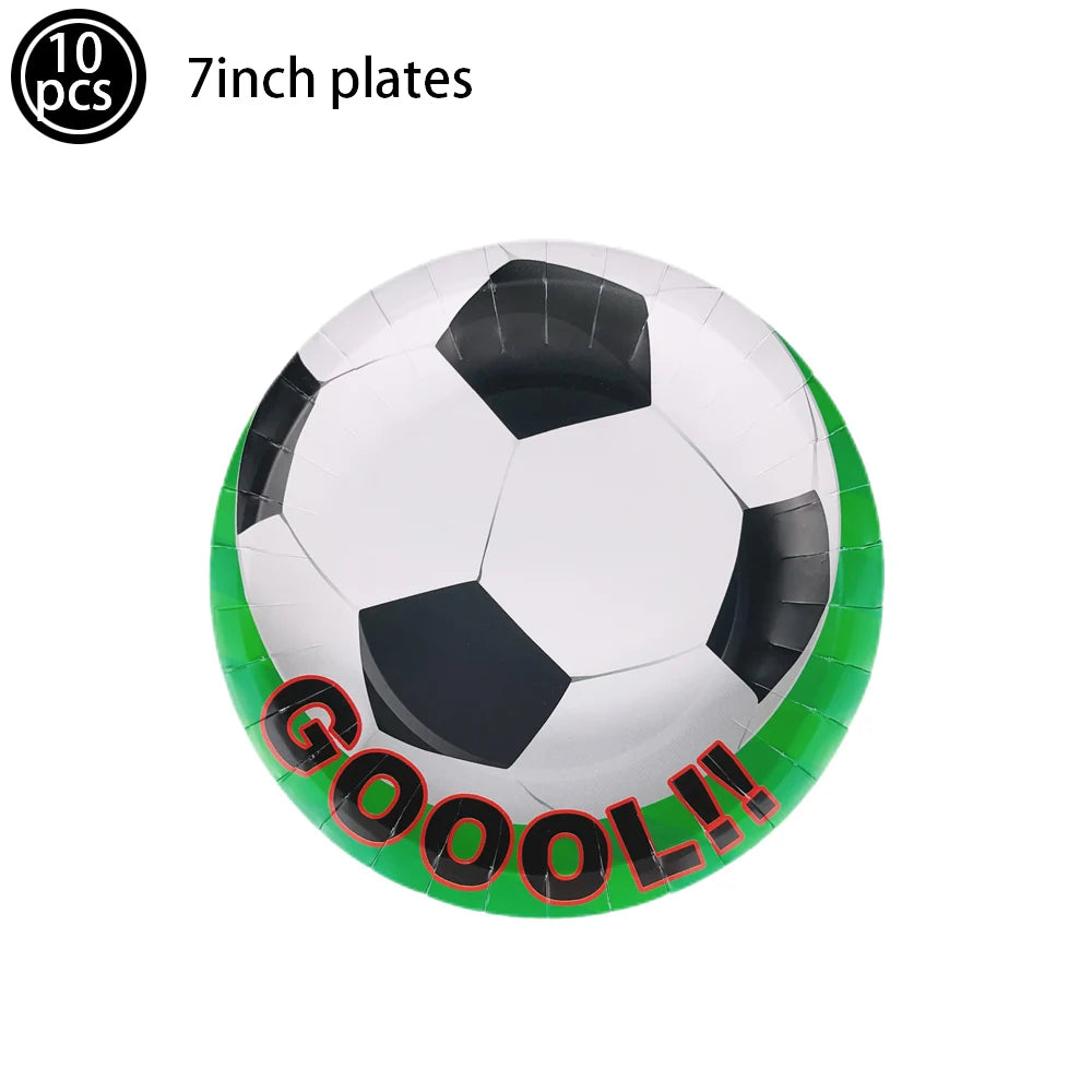 A soccer ball cake topper featuring a white and black soccer ball design with the word GOOOL on it.