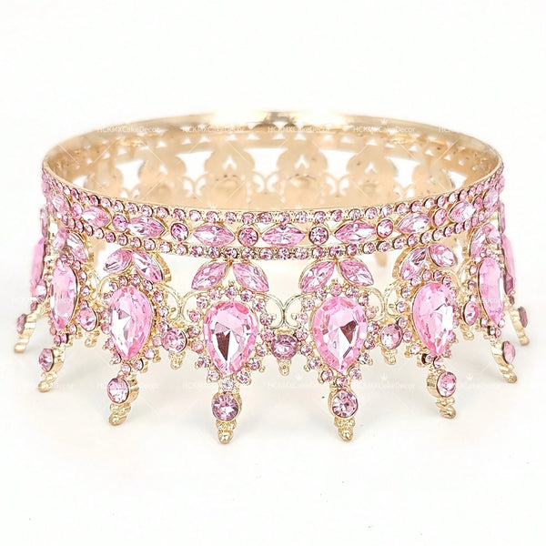 Gold and pink crystal rhinestone crown cake topper featuring intricate floral designs