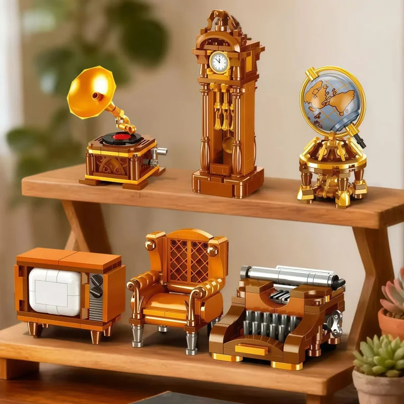 A collection of vintage-style miniature models including an old-fashioned lamp, a clock tower, and furniture pieces on a wood