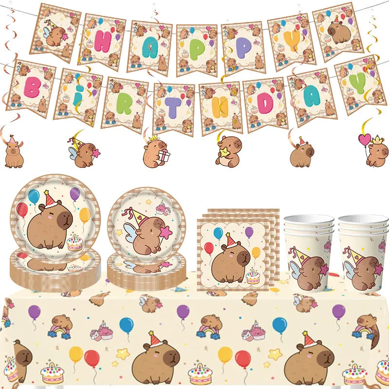 A collection of happy capybara themed birthday party decorations including banners, cupcake toppers, and themed food items.