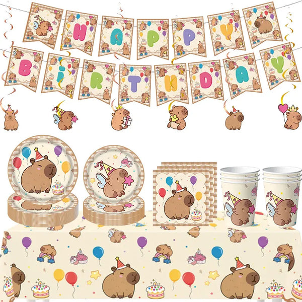 A collection of happy capybara themed birthday party decorations including banners, cupcake toppers, and themed food items.