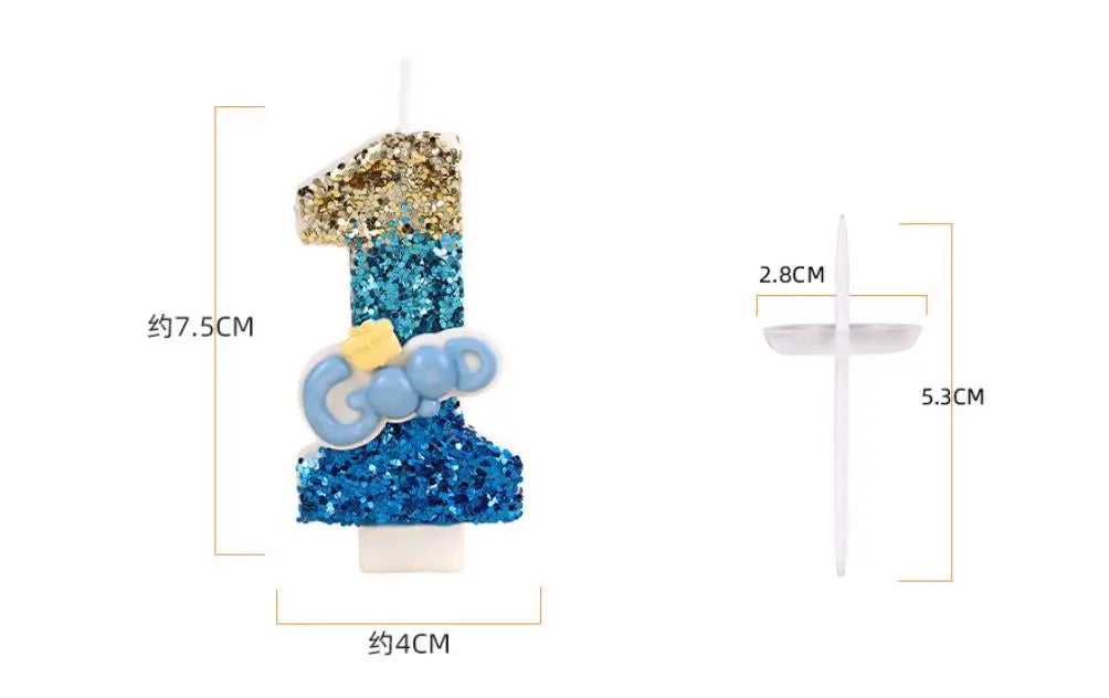 A tall birthday candle shaped like the number one, decorated with blue and gold glitter.