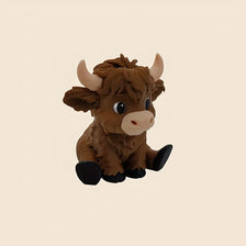 A 3D printed statue of a brown Highland cow sitting down, featuring large horns and dark feet.