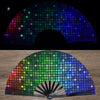 A UV fluorescent folding fan displaying a spectrum of colors across an arc.