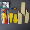 A set of whistling balloon helicopter toys including a model and various yellow and beige plastic parts.