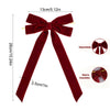 A deep red velvet bow with a wide ribbon, measuring 13cm long.