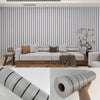Roll of self-adhesive wood grain wallpaper showing a textured gray pattern.