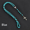 Blue beaded rosary necklace with a silver cross pendant
